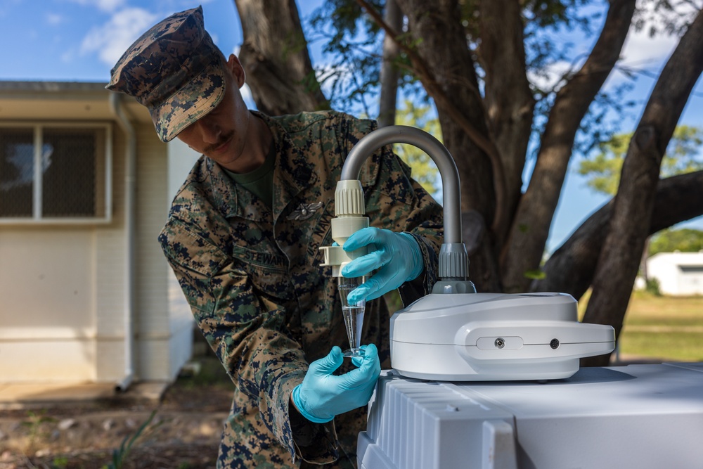 MRF-D 24.3: U.S. Navy medical personnel collect bacteria samples