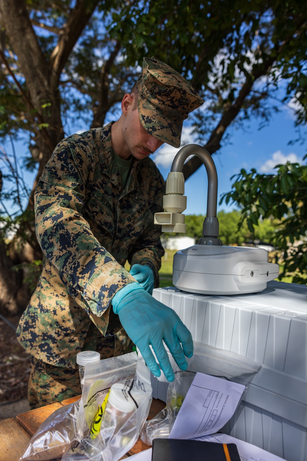 MRF-D 24.3: U.S. Navy medical personnel collect bacteria samples