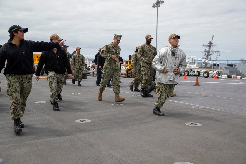 USS Tripoli's Sailors Conduct Flight Deck Firefighting Training