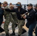 USS Tripoli's Sailors Conduct Flight Deck Firefighting Training