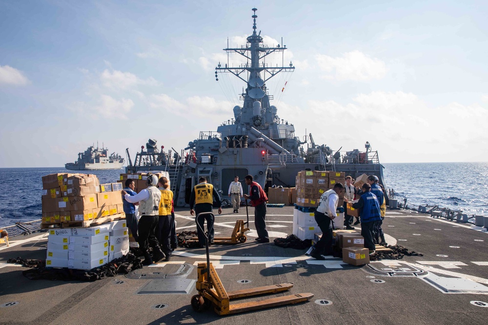 USS Russell (DDG 59) vertical replenishment with USNS Wally Schirra (T-AKE 8)