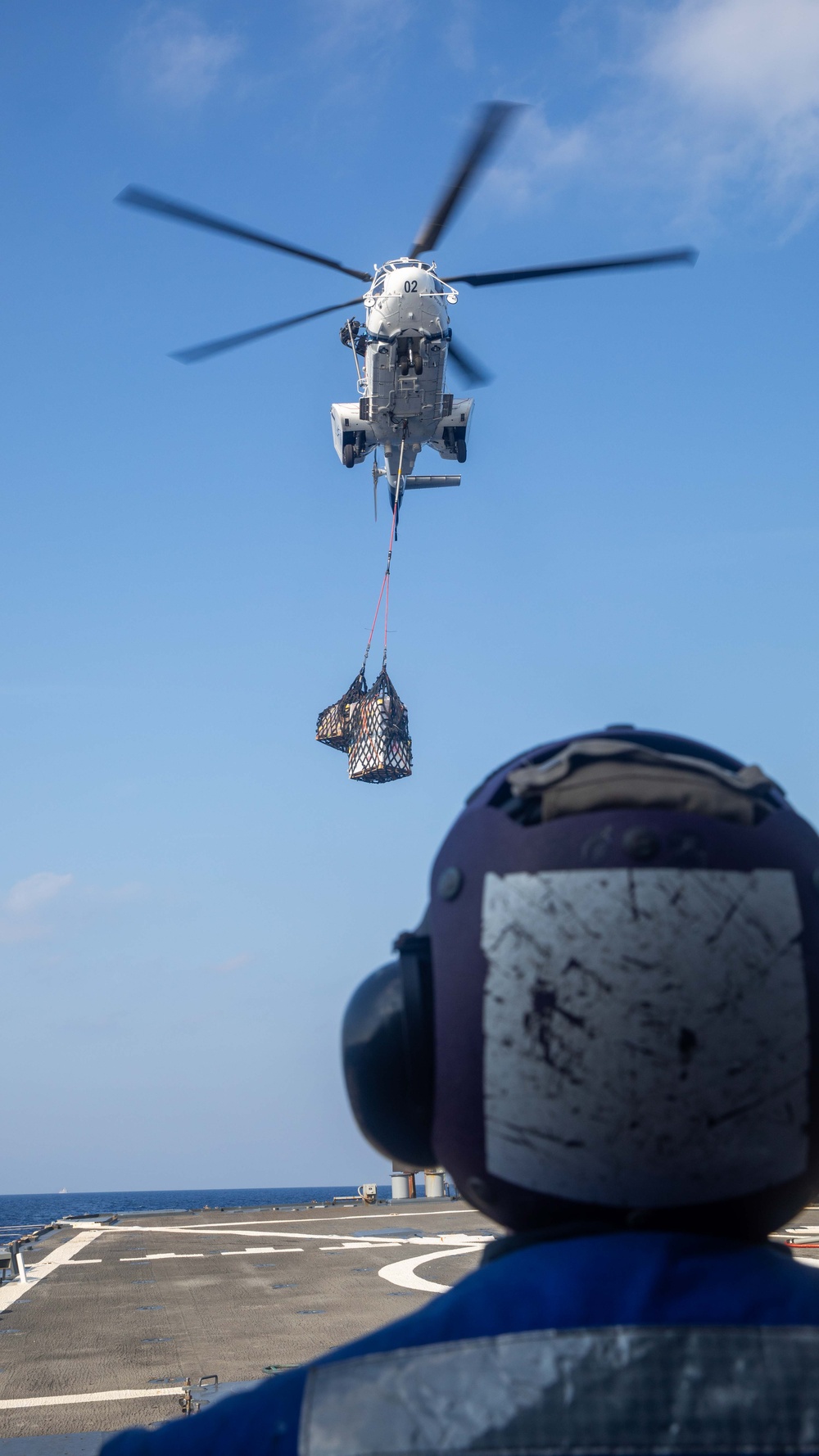 USS Russell (DDG 59) vertical replenishment with USNS Wally Schirra (T-AKE 8)