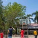 USS Russell (DDG 59) sailors participate in a community relations event at Father Ray Children’s Village