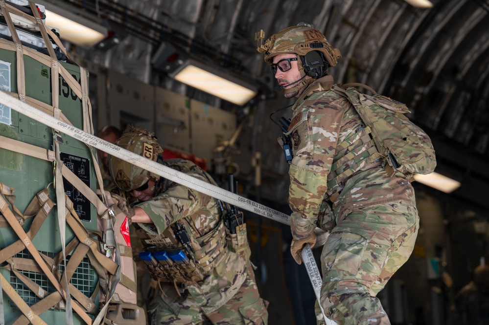Contingency Response Airmen unload a C-17 during Air Mobility Command's 2024 Spring Industry Preview