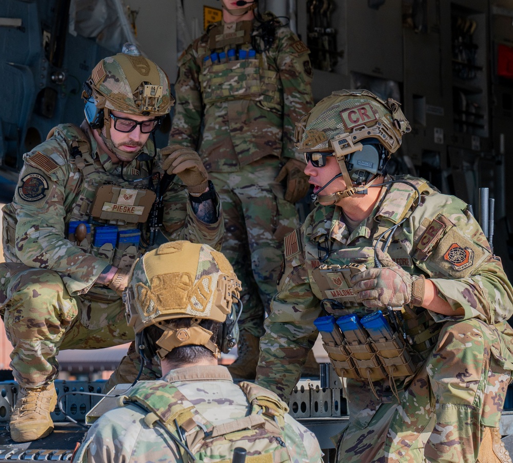 Contingency Response Airmen unload a C-17 during Air Mobility Command's 2024 Spring Industry Preview