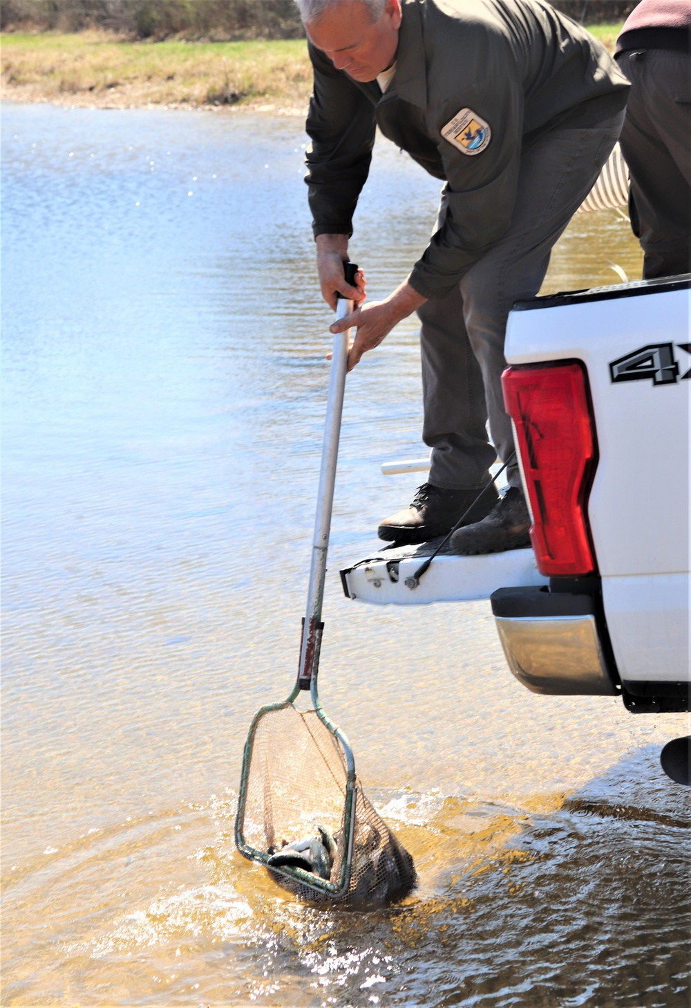 USFWS stocks more than 15,000 rainbow trout in Fort McCoy’s waterways for 2024 fishing season