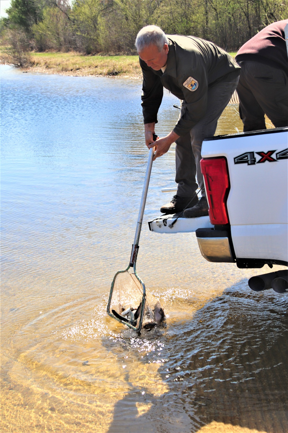 USFWS stocks more than 15,000 rainbow trout in Fort McCoy’s waterways for 2024 fishing season