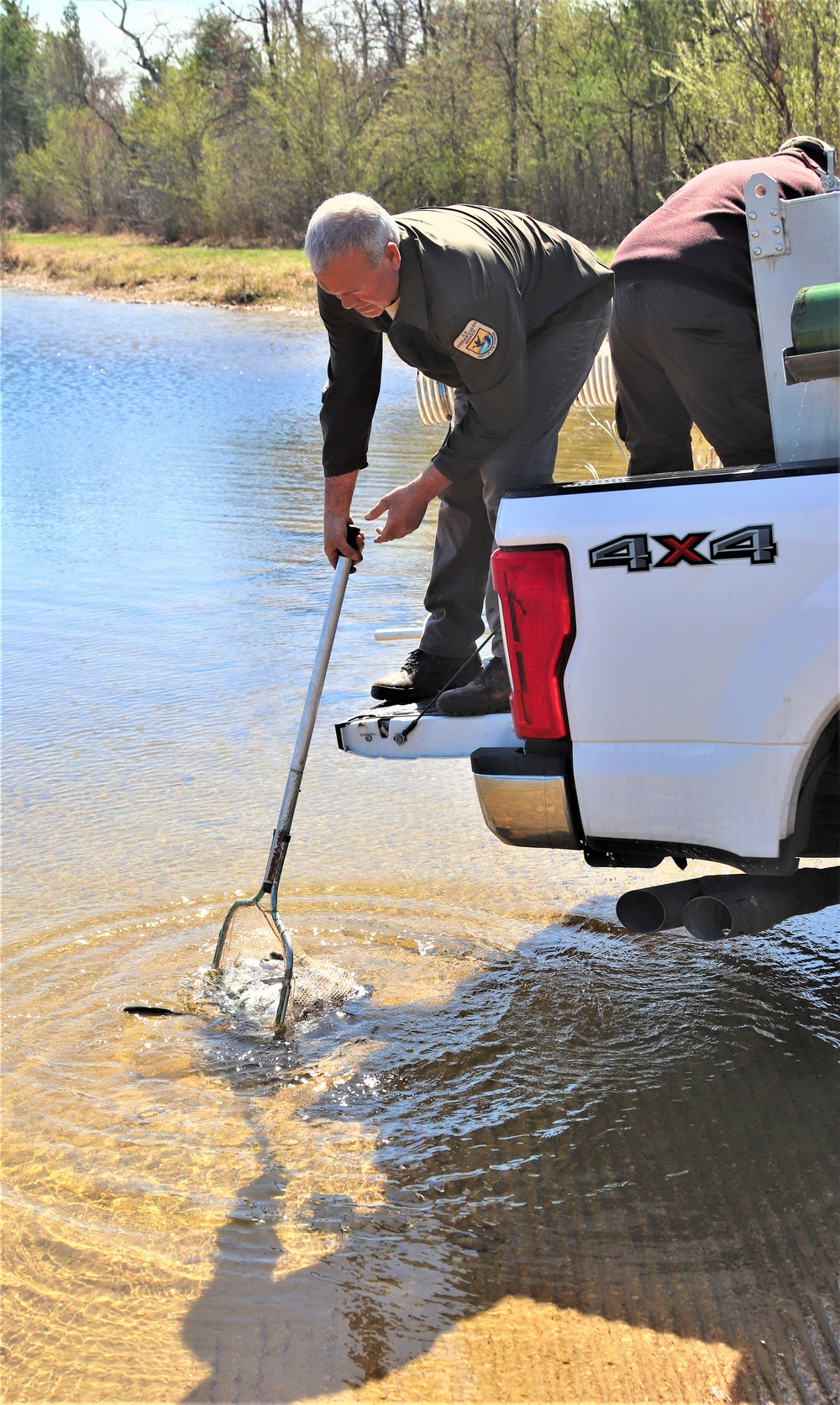 USFWS stocks more than 15,000 rainbow trout in Fort McCoy’s waterways for 2024 fishing season