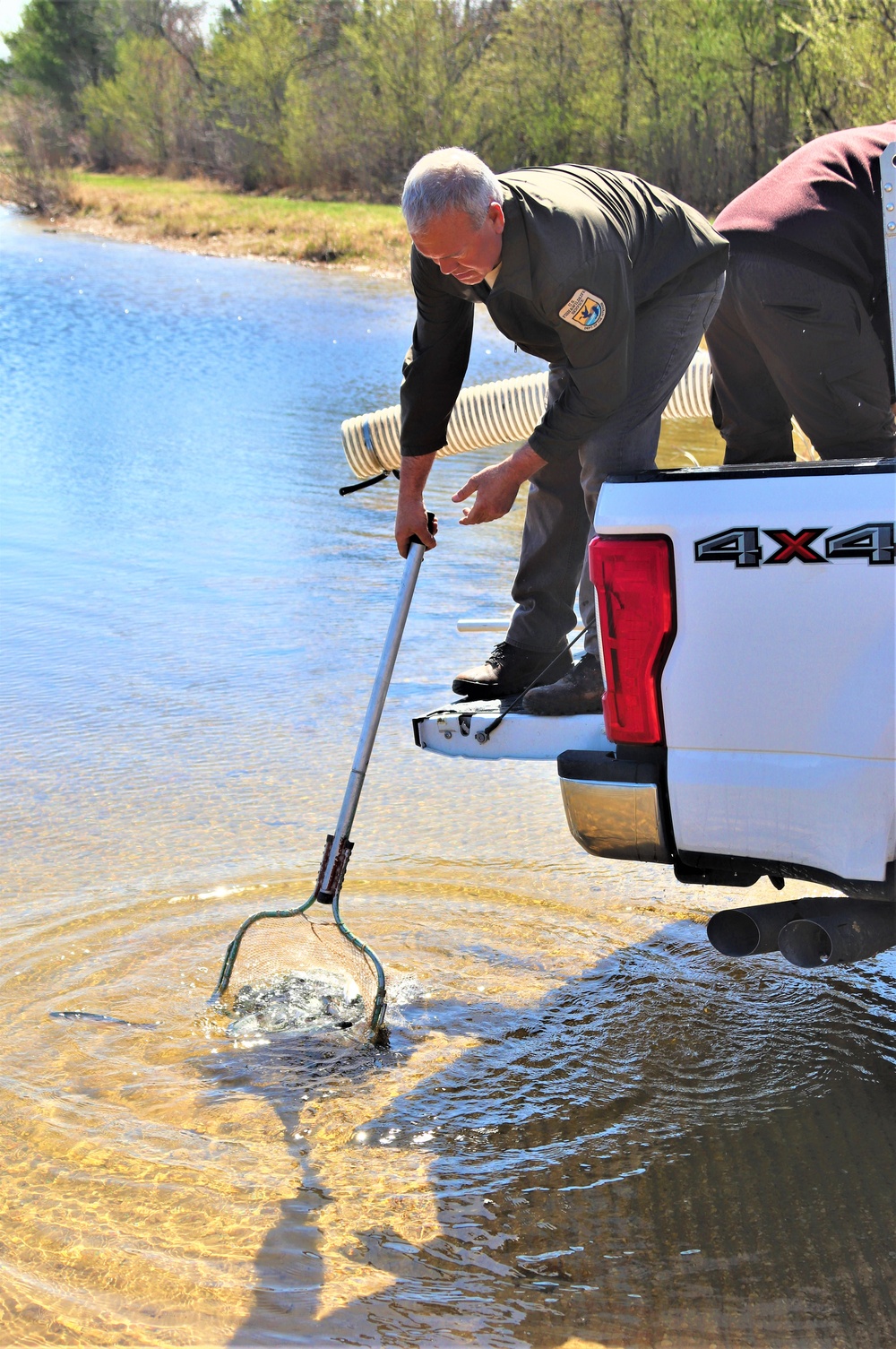 USFWS stocks more than 15,000 rainbow trout in Fort McCoy’s waterways for 2024 fishing season