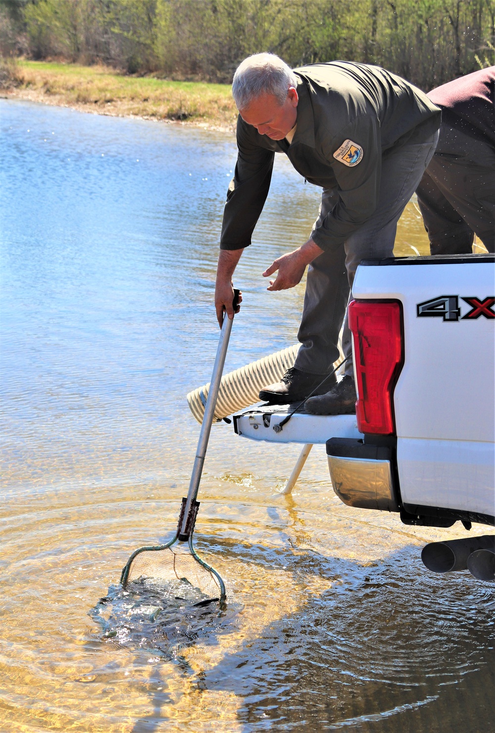 USFWS stocks more than 15,000 rainbow trout in Fort McCoy’s waterways for 2024 fishing season