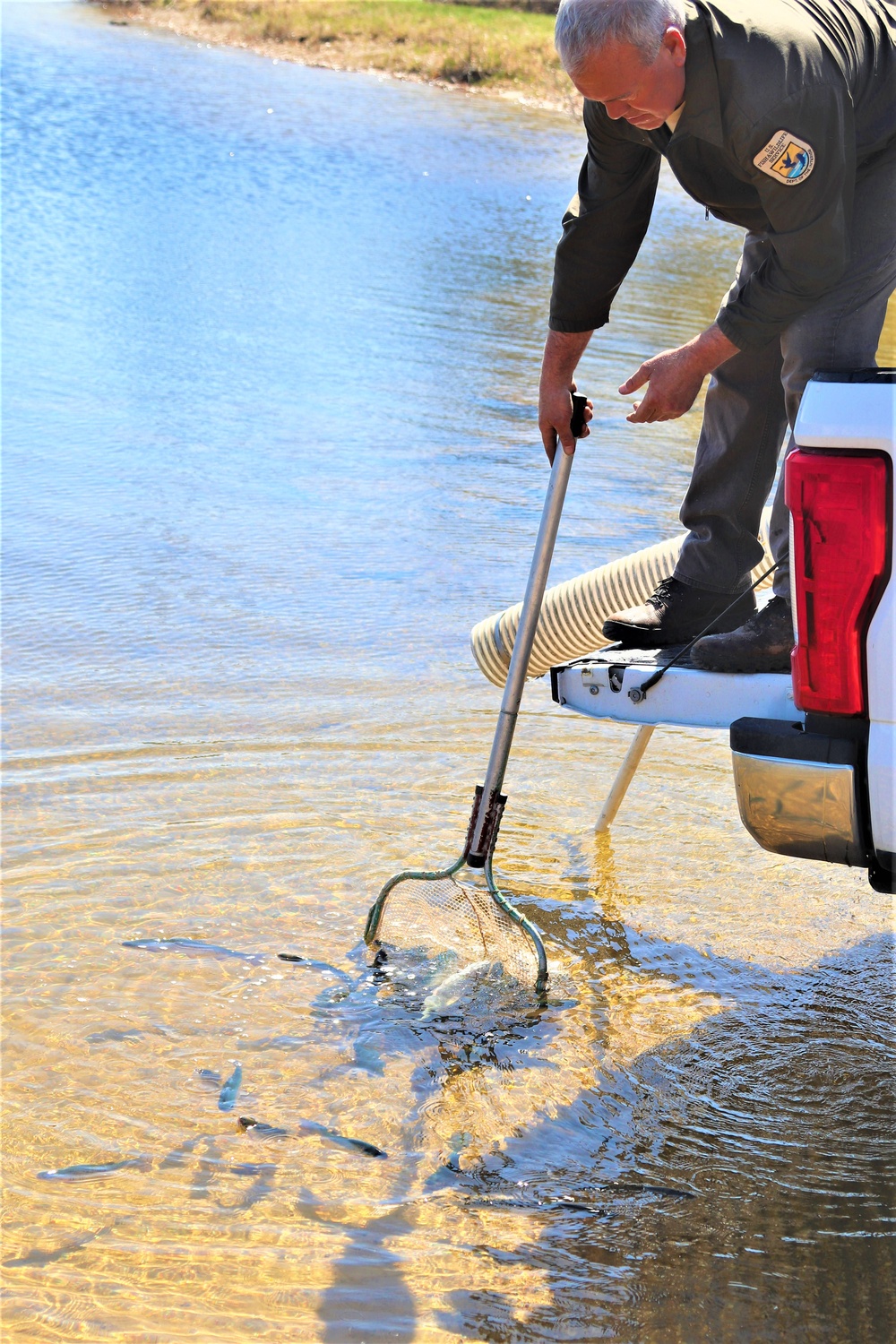 USFWS stocks more than 15,000 rainbow trout in Fort McCoy’s waterways for 2024 fishing season