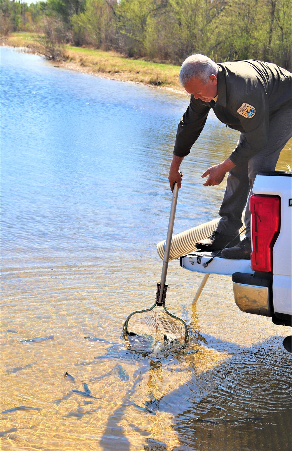 USFWS stocks more than 15,000 rainbow trout in Fort McCoy’s waterways for 2024 fishing season