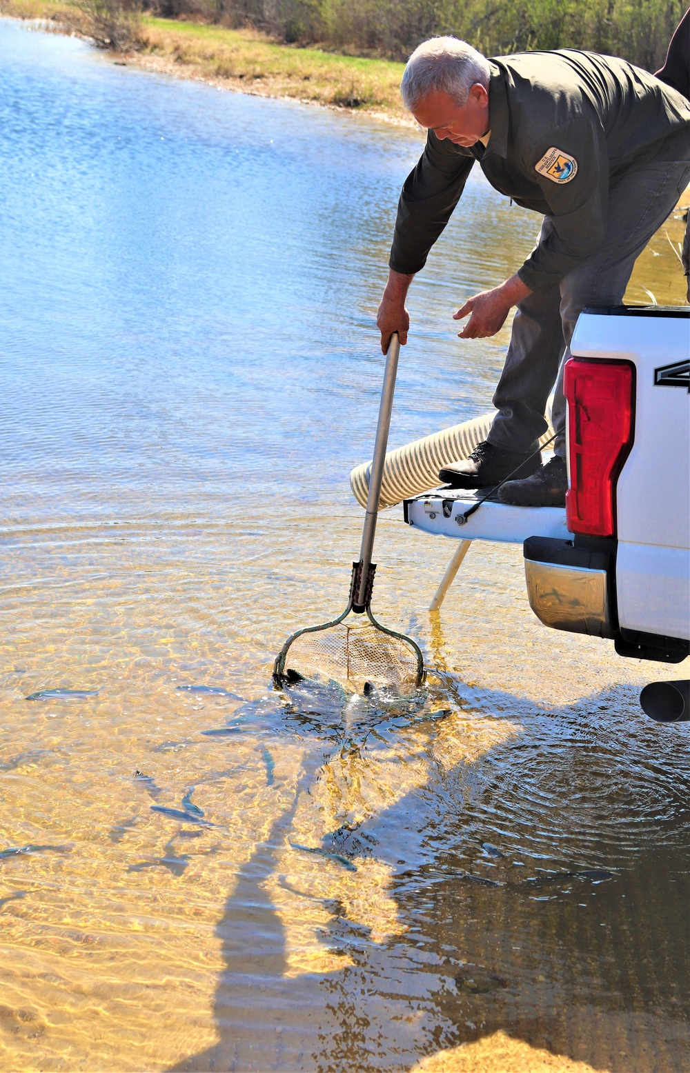 USFWS stocks more than 15,000 rainbow trout in Fort McCoy’s waterways for 2024 fishing season