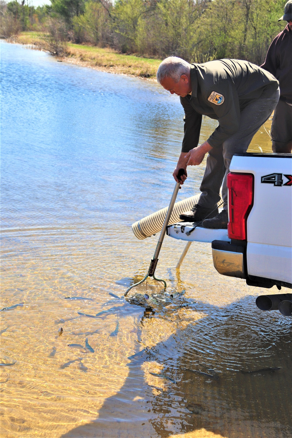 USFWS stocks more than 15,000 rainbow trout in Fort McCoy’s waterways for 2024 fishing season