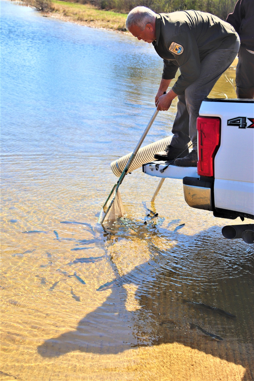 USFWS stocks more than 15,000 rainbow trout in Fort McCoy’s waterways for 2024 fishing season