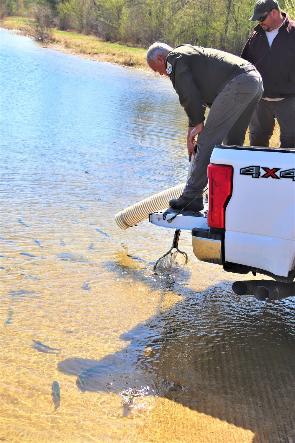 USFWS stocks more than 15,000 rainbow trout in Fort McCoy’s waterways for 2024 fishing season