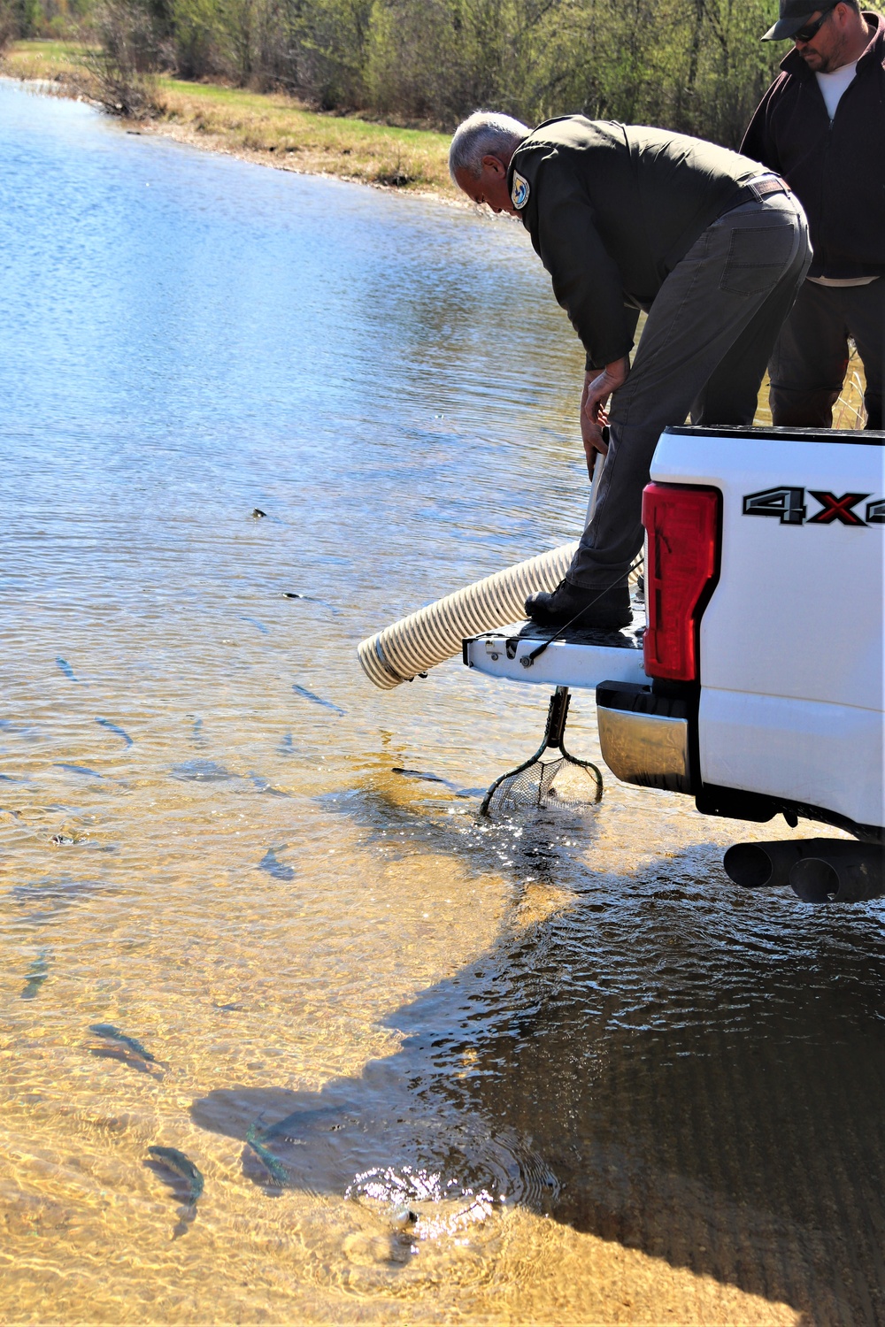 USFWS stocks more than 15,000 rainbow trout in Fort McCoy’s waterways for 2024 fishing season