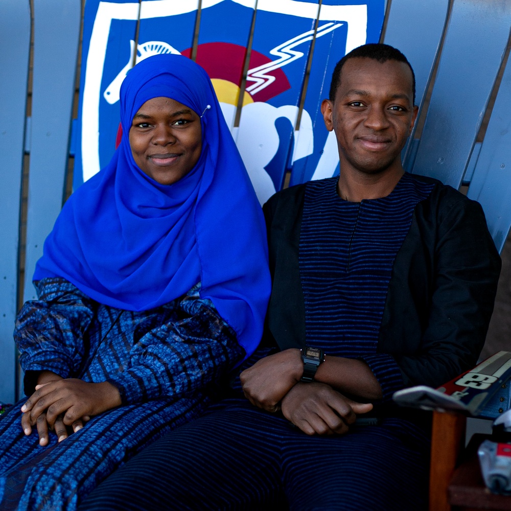 10th SFG(A) Soldier sits with his wife after reuniting