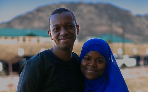 10th SFG(A) Soldier hugs his wife at 3rd Battalion headquarters