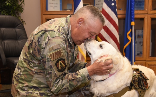 Iowa Air Guard support dog, and Chaplain reunite following six month deployment