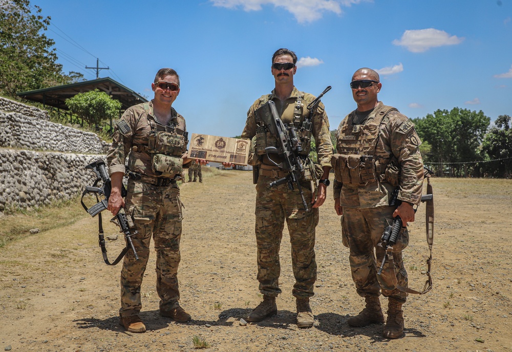 Balikatan 24: Alpha Company, 2nd Battalion, 27th Infantry Regiment, 3rd Infantry Brigade Combat Team, 25th Infantry Division take group photos with 1st Battalion, 77th Infantry Battalion, 5th Infantry Division