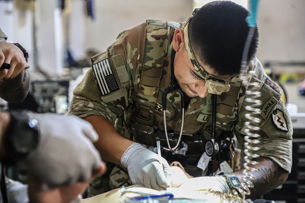 24: 2nd Battalion, 27th Infantry Regiment, 3rd Infantry Brigade Combat Team, 25th Infantry Division conduct medical training with the Australian Army 4th Health Battalion