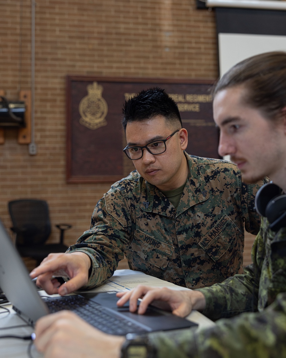 U.S. Marines and Canadian Soldiers plan to defend against cyber attacks