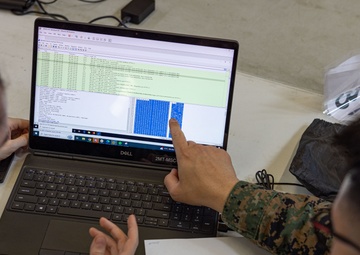 U.S. Marines and Canadian Soldiers plan to defend against cyber attacks