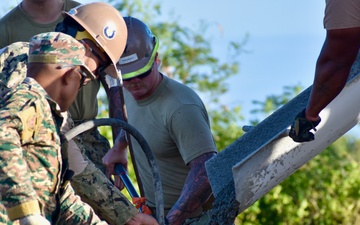 NMCB 4 Seabees and Timor-Leste Defense Force Engineers Lay Warehouse Foundation