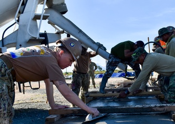 NMCB 4 Seabees and Timor-Leste Defense Force Engineers Lay Warehouse Foundation