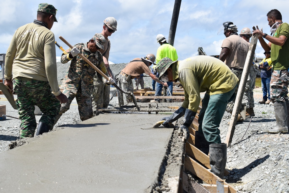 NMCB 4 Seabees and Timor-Leste Defense Force Engineers Lay Warehouse Foundation
