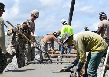 NMCB 4 Seabees and Timor-Leste Defense Force Engineers Lay Warehouse Foundation