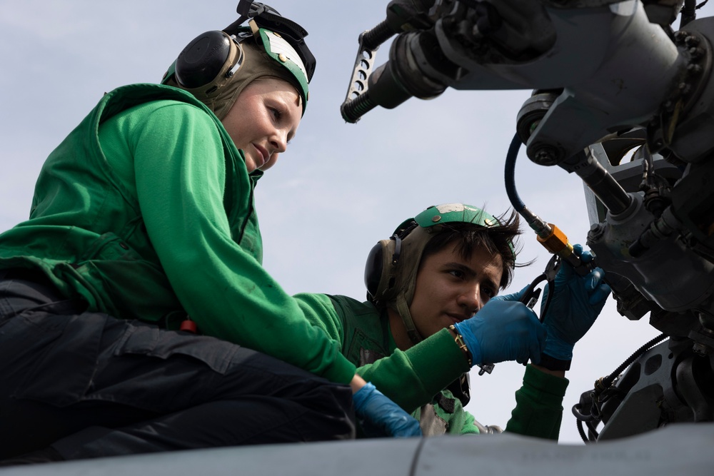 HSC 26 Sailors Conduct Maintenance on an MH-60s Seahawk aboard the USS Bataan