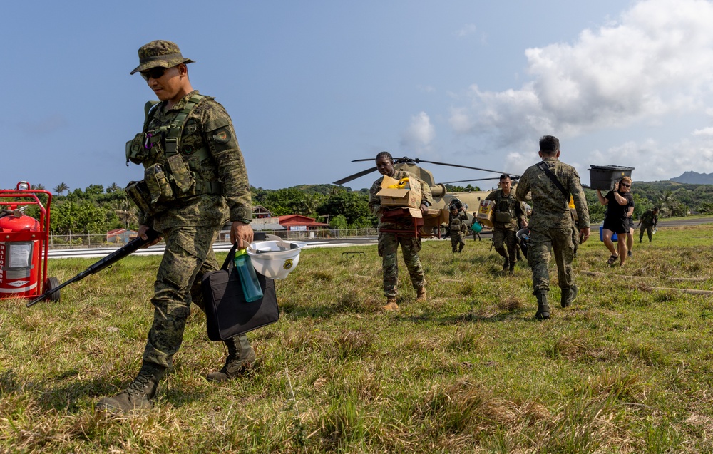 Balikatan 24: AFP download of equipment at Basco Airport