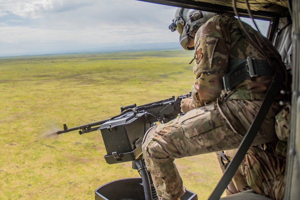 Airmen conduct aerial gunnery training from UH-1N Hueys over Idaho's OCTC ranges