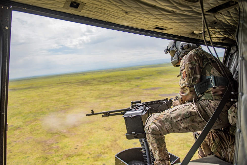 Airmen conduct aerial gunnery training from UH-1N Hueys over Idaho's OCTC ranges