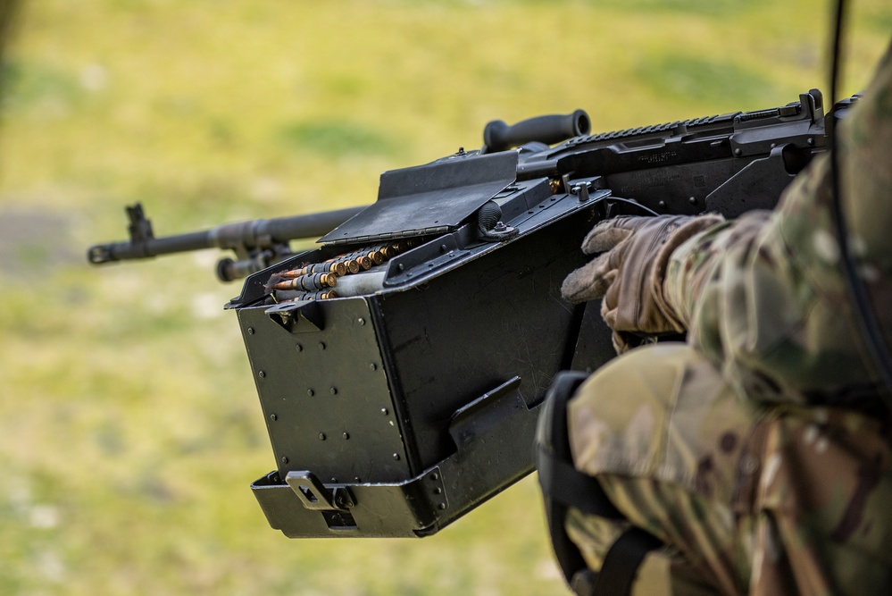 Airmen conduct aerial gunnery training from UH-1N Hueys over Idaho's OCTC ranges