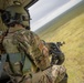 Airmen conduct aerial gunnery training from UH-1N Hueys over Idaho's OCTC ranges