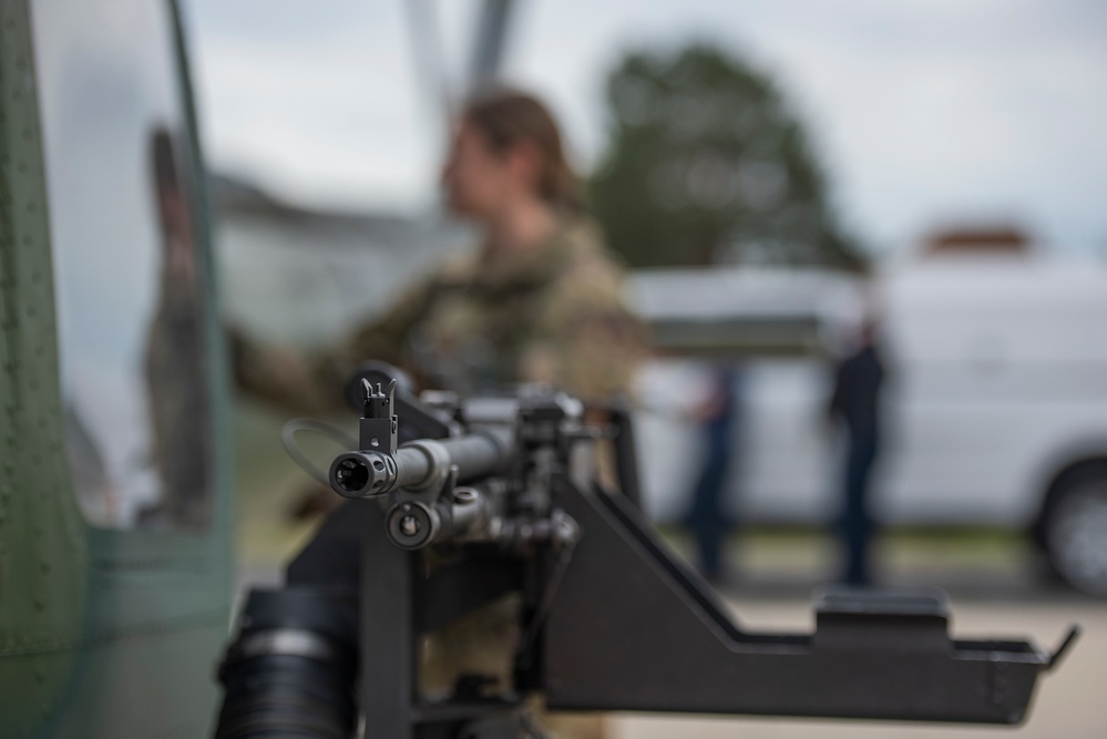 Airmen conduct aerial gunnery training from UH-1N Hueys over Idaho's OCTC ranges
