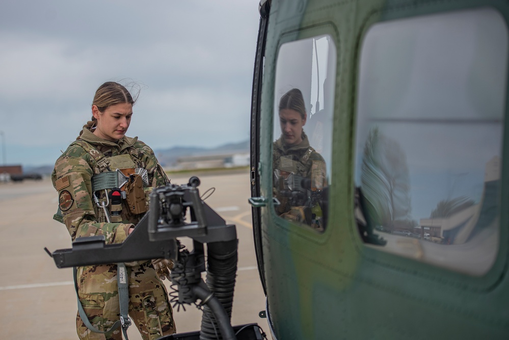 Airmen conduct aerial gunnery training from UH-1N Hueys over Idaho's OCTC ranges