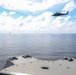 Sailors aboard the USS Howard conduct flight quarters in the South China Sea