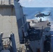 Sailors aboard the USS Howard conduct flight quarters in the South China Sea