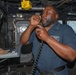 Sailors aboard the USS Howard conduct flight quarters in the South China Sea