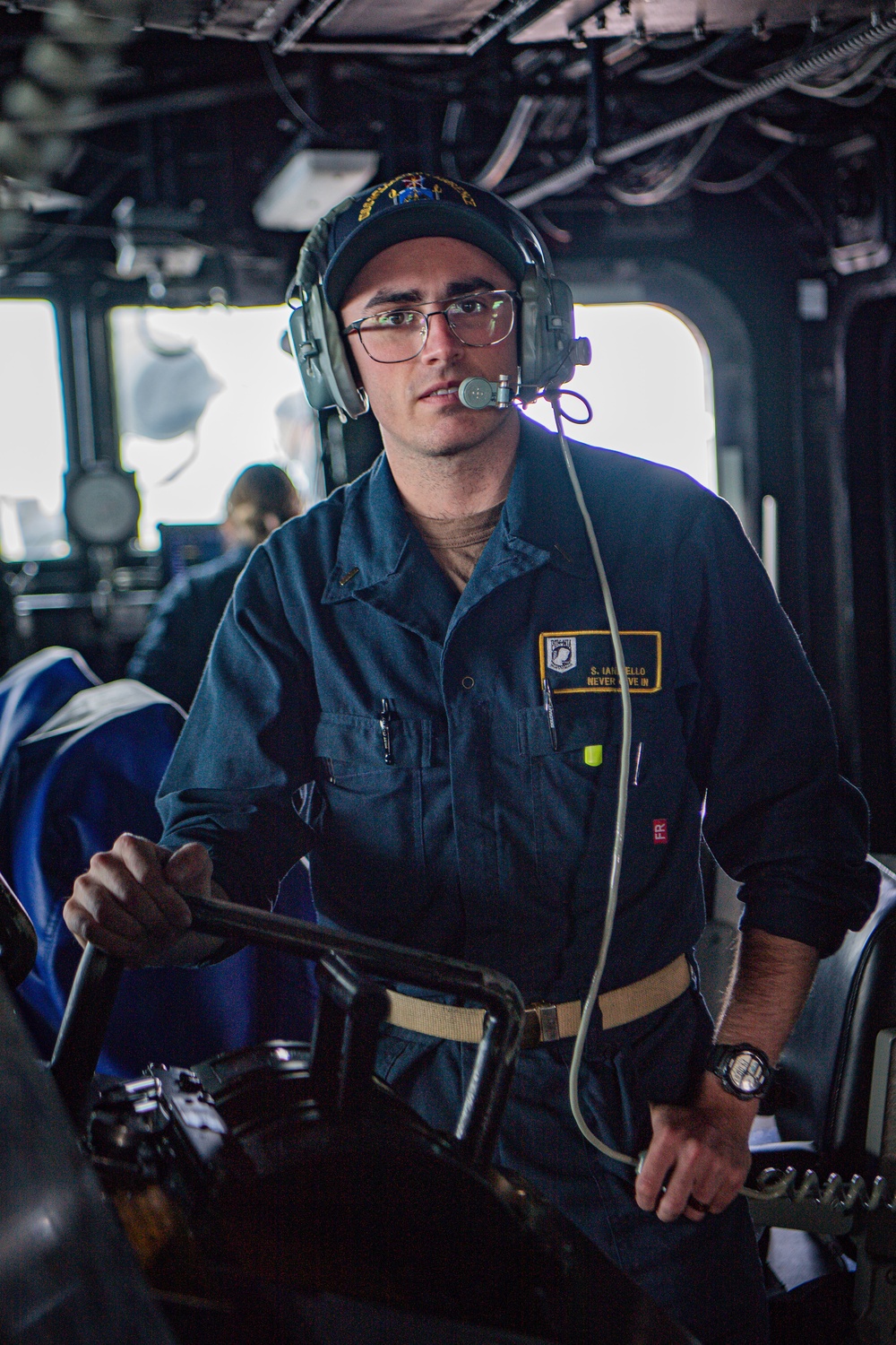 Sailor Stands Junior Officer of the Deck Watch Aboard USS William P. Lawrence