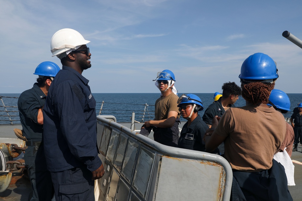 Sailors aboard the USS Howard conduct a sea and anchor detail in Si Racha, Thailand