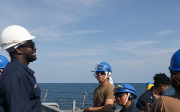 Sailors aboard the USS Howard conduct a sea and anchor detail in Si Racha, Thailand