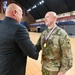 Col. Brian R. Deaton presented the Order of Saint Michael-Airborne