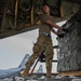 Airmen load two AFCENT C-130s with humanitarian aid bound for Gaza