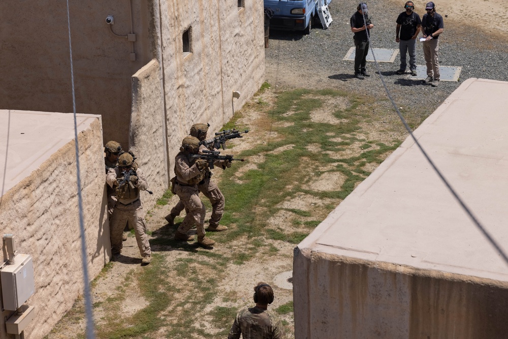 3rd Bn., 4th Marines patrols through infantry immersion trainer