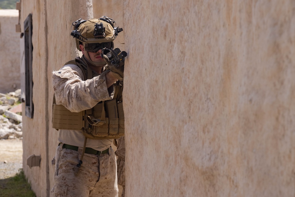 3rd Bn., 4th Marines patrols through infantry immersion trainer